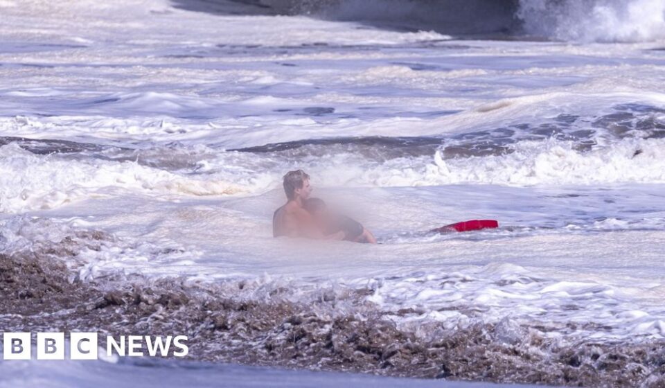 Bystander video shows teen lifeguard's dramatic ocean rescue