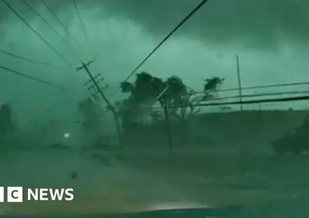 Dashcam captures tornado toppling power lines onto car