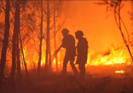 French firefighters battle the blaze with local residents through the night