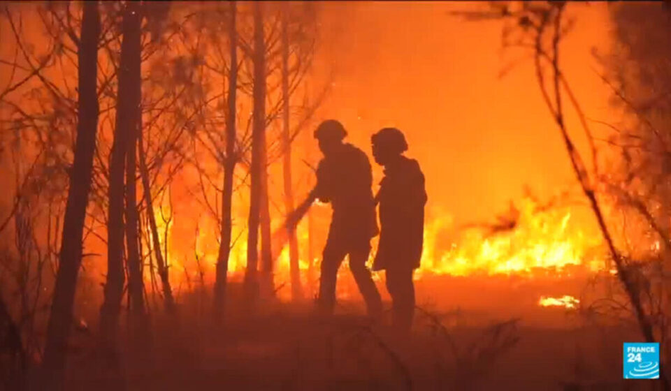 French firefighters battle the blaze with local residents through the night
