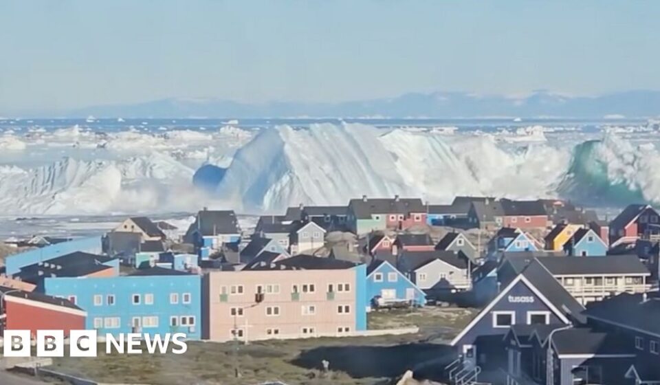 Giant iceberg turns over near Greenland's coast