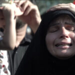 In Tehran, funeral attendees grieve the loss of supreme leader Ali Khamenei