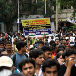 Indian police baton-charge 'Cockroach Party' protesters marching to parliament