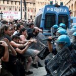 Italy protests: Dozens hurt in Bologna after man dies while being restrained by police
