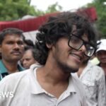 Protesters celebrate resignation of India's education minister
