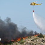 Spain battles to contain one of its deadliest wildfires as at least 12 killed