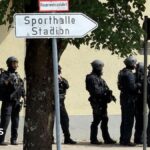 Two girls seriously injured in German school attack.