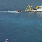 U.S. condemns China after Philippine sailor injured at disputed shoal