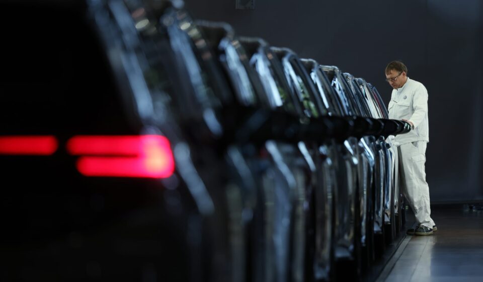 Volkswagen profit falls, revises down full-year revenue outlook