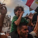 Watch: Football fans in Gaza watch World Cup match from rubble