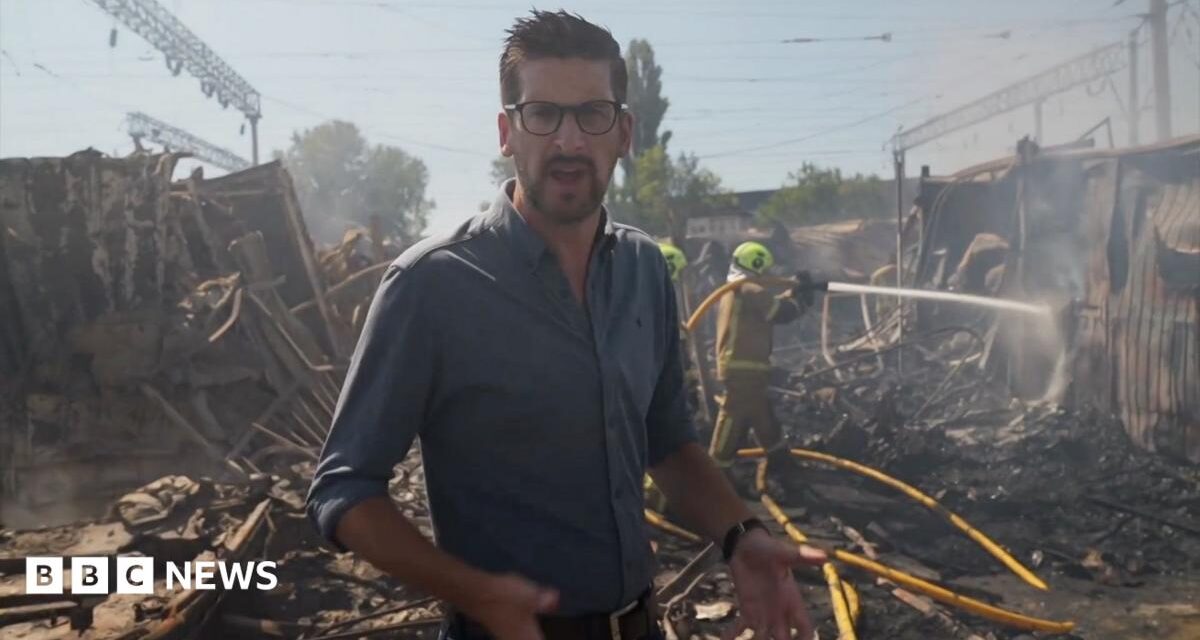 BBC visits smouldering Kyiv market after Russian strikes