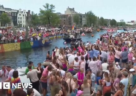 Crowds line Amsterdam's canals for Pride boat parade