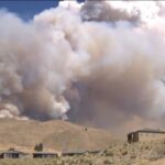 Emergency declared in Nevada as wildfire forces evacuation of 14,000 people