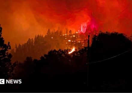 Fast-moving Canada wildfire doubles in size forcing thousands to flee homes
