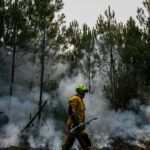 French firefighters stop wildfires' spread but they continue to burn
