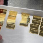 Gold bugs spend $180 million betting all's clear for metal as bond yields stall