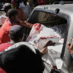 Haiti gang members kill around 40 displaced people in church attack near capital