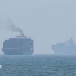 Hormuz talks positive, Oman says, as Iran warns deal would not open strait