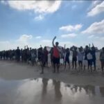 Hundreds of Gaza children join a mass swimming lesson to cope with trauma