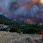 In blazing Greece, anger grows among residents forced to evacuate