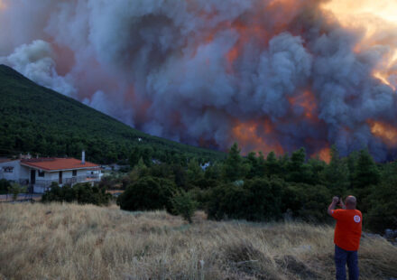 In blazing Greece, anger grows among residents forced to evacuate