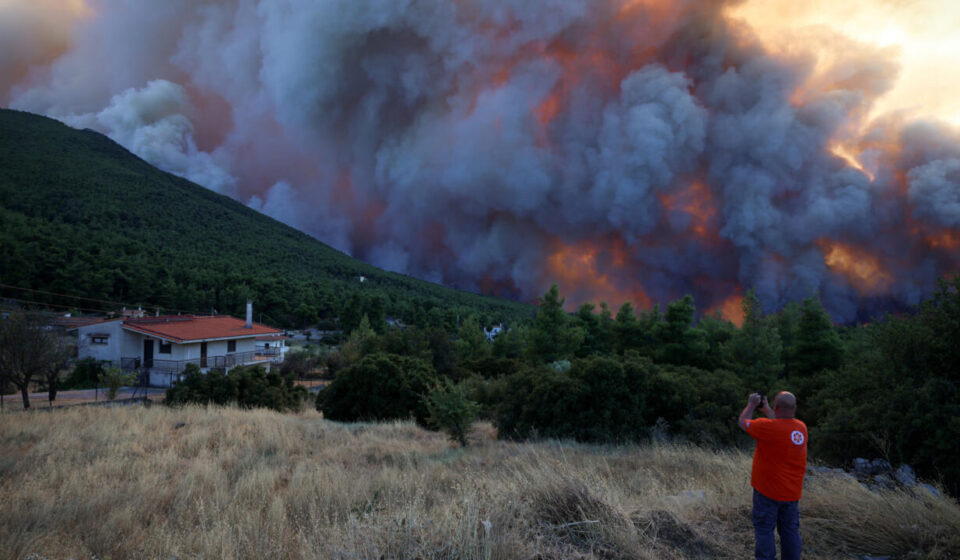 In blazing Greece, anger grows among residents forced to evacuate