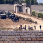Israeli troops fail to remove settlers besieging Palestinian homes in West Bank village