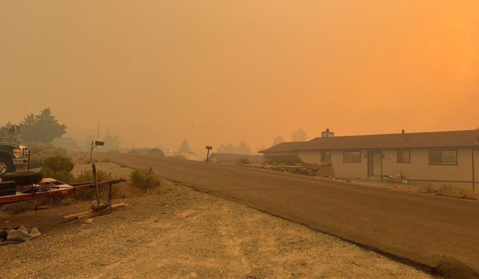 Nevada wildfire forces tens of thousands to evacuate as blaze threatens city of Reno