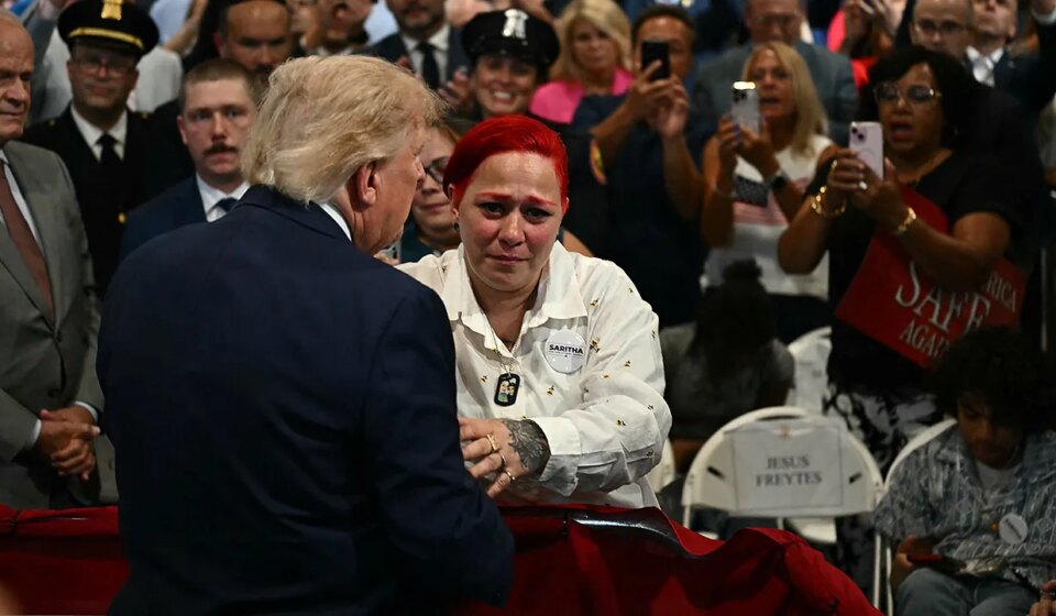 President Donald Trump exits speech stage to hug Jacob Freytes' grieving parents