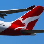 Qantas shares jump on earnings as airline updates business class