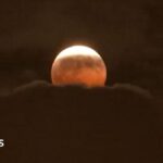 Stargazers around the world glimpse 'Blood Moon' lunar eclipse