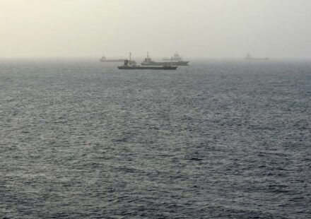 Tankers near Oman come under fire as Iran threatens shipping routes