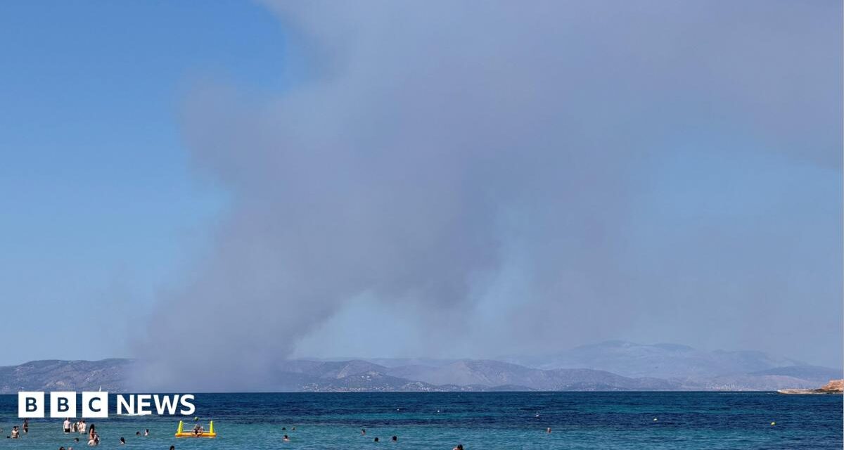 Two dead and hundreds evacuated as wildfires break out near Athens