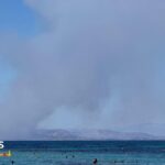 Two dead and hundreds evacuated as wildfires break out near Athens