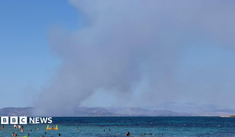 Two dead and hundreds evacuated as wildfires break out near Athens