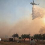 Two helicopters fighting Greece wildfires collide