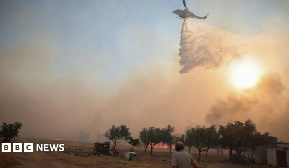 Two helicopters fighting Greece wildfires collide