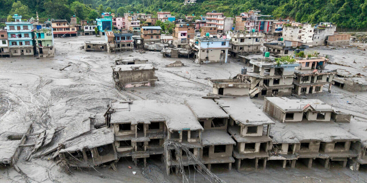 Week in pictures: devastating floods in Nepal, death of Dolly Parton and a tornado in France