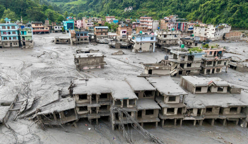 Week in pictures: devastating floods in Nepal, death of Dolly Parton and a tornado in France