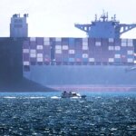 Who controls the Strait of Hormuz, where traffic declined amid the Iran war