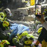 Woman pulled alive from rubble 36 hours after Colombia quake