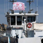 French fishermen blockade ports over soaring fuel costs as budget fight looms