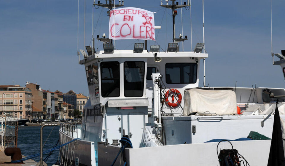 French fishermen blockade ports over soaring fuel costs as budget fight looms