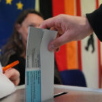 Germans vote in elections threatening fresh blow to Merz