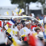 Huge crowds cheer Pope Leo along Champs-Elysees ahead of Paris mass