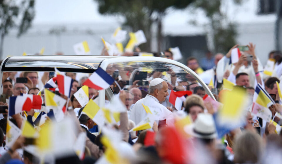 Huge crowds cheer Pope Leo along Champs-Elysees ahead of Paris mass