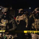 ICE agent charged with lying about shooting Venezuelan man during crackdown