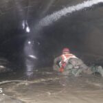 Nepal rescuers try to reach dozens trapped in tunnel after two pulled out alive