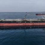 Oil falls as crude flows remain 'surprisingly strong'