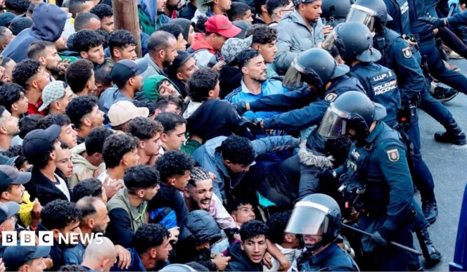 Police begin operation to move migrants from Ceuta beaches